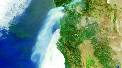 Overhead shot of fighting fire along the California coast